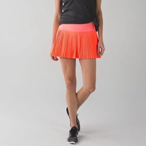 Lululemon Pleat to Street Skirt II in "Grapefruit" Neon Size 8